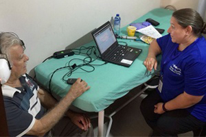 Image of Audio Help audiology team doing hearing test during a mission trip in 2019.