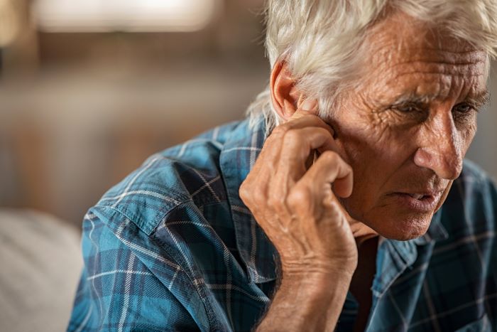 Elderly man with ear ache